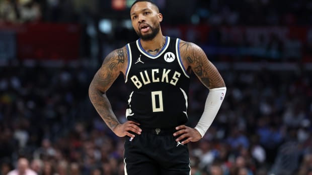 Milwaukee Bucks guard Damian Lillard (0) reacts to a call during the third quarter against the Los Angeles Clippers 
